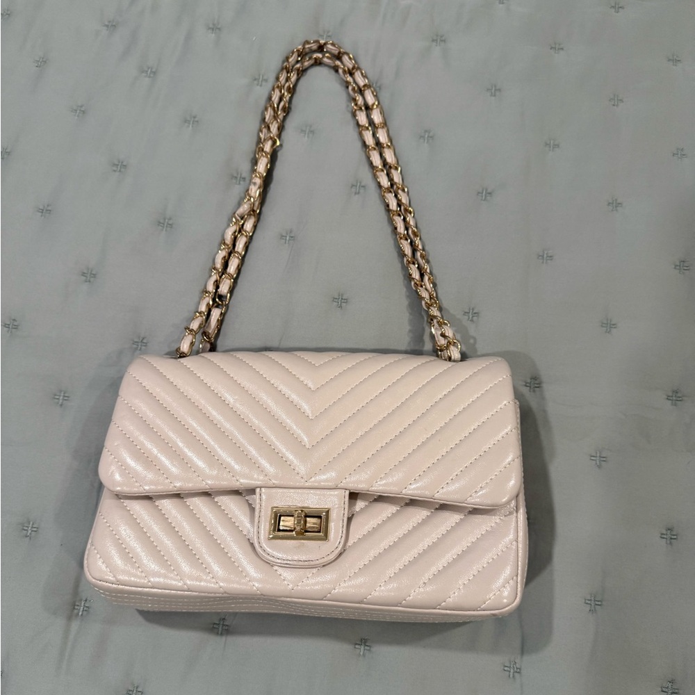Cream (beige) quilted shoulder bag. Convertible chain length, lots of pockets